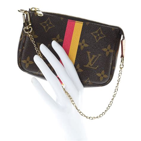 mini pochette accessoires my lv heritage|More.